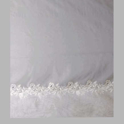 Sheer fabric in voile with embroidered border