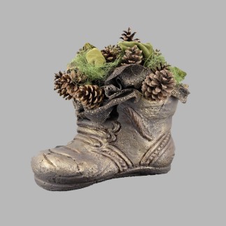 Flower arrangement in concrete shoe