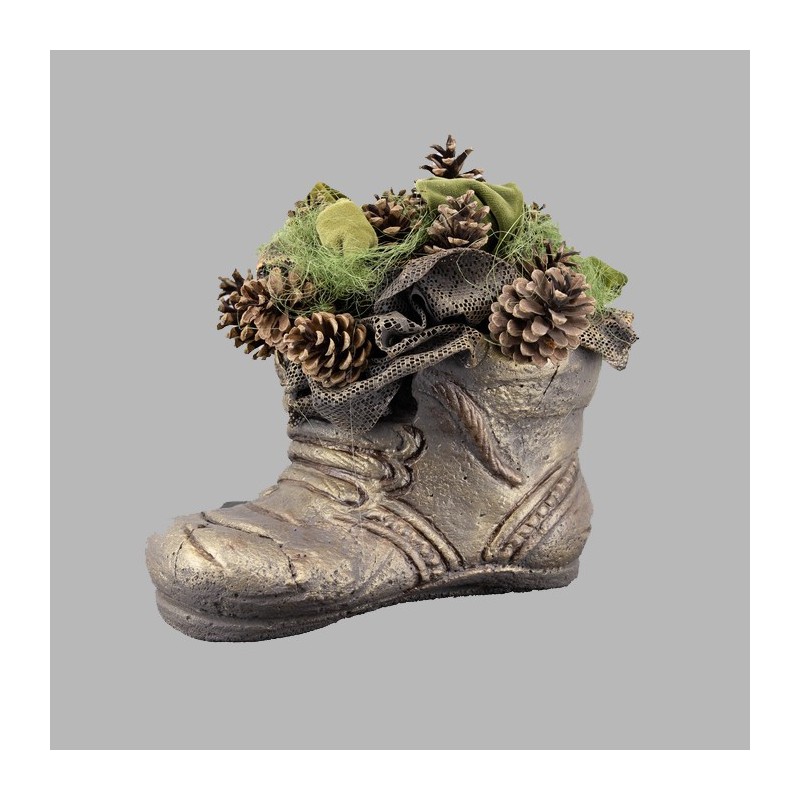 Flower arrangement in concrete shoe