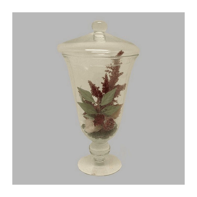arrangement in glass vase with lid