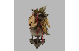flower arrangement in tin can