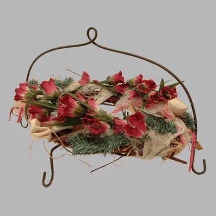 Bloemstuk krans op voetstuk