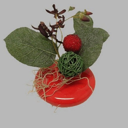 Bloemstuk in kleine vaas 10 cm