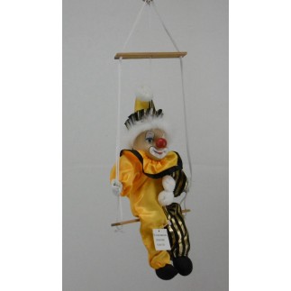 Clown sur Balançoire – Une Nostalgie Ludique pour Tout Intérieur