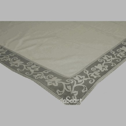 Top robe avec une bordure grise avec des feuilles