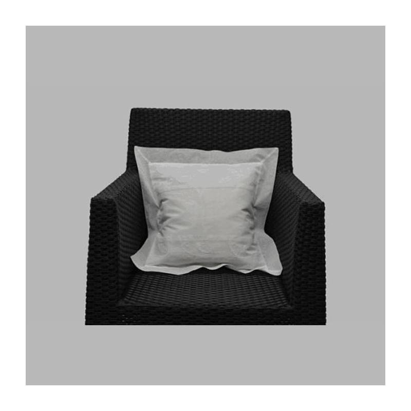 Cushion cover with white leaf design