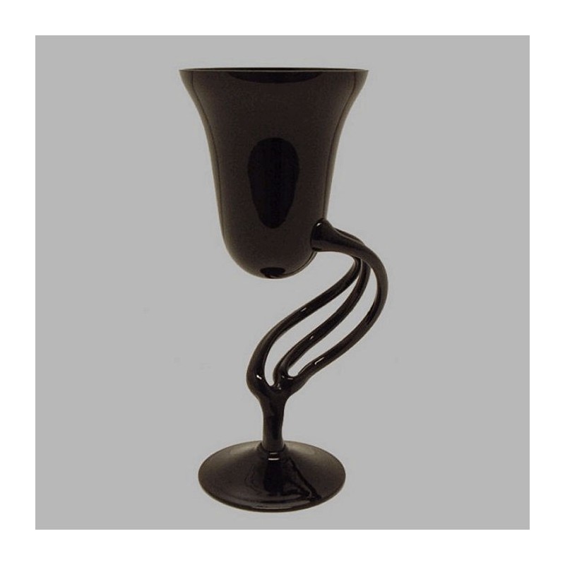 vase de fleurs sur un socle incurv