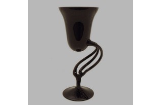 curved flower vase on pedestal