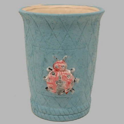 Hoge bloempot met lieveheersbeestje