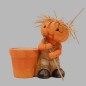Pot de fleurs avec homme citrouille de céramique