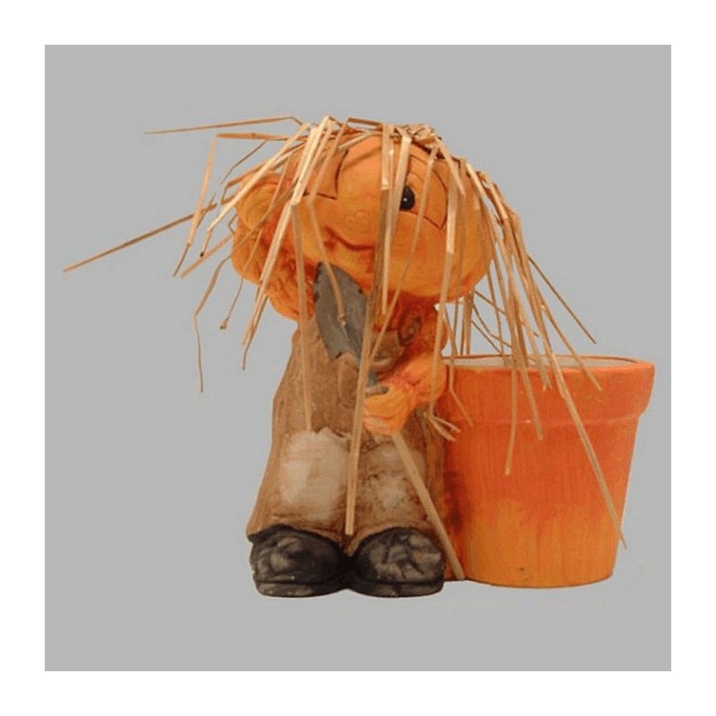 Pot de fleurs avec homme citrouille de céramique