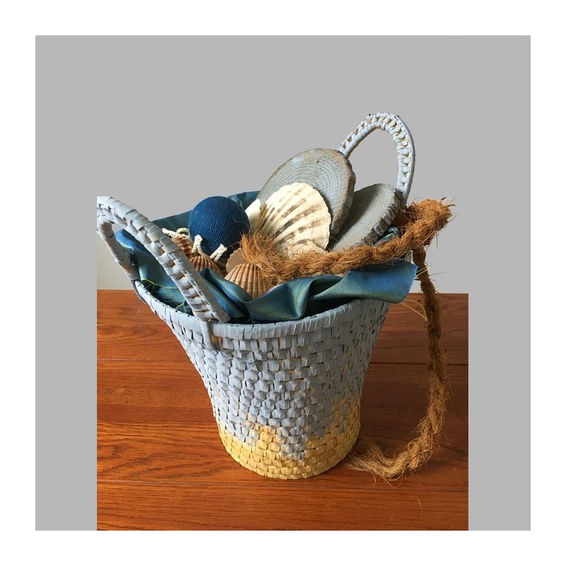 Basket filled with decoration sea and beach Basket filled with decoration sea and beach