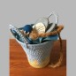 Basket filled with decoration sea and beach Basket filled with decoration sea and beach