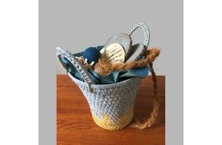 Basket filled with decoration sea and beach