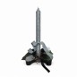 Silver candle in ceramic floral arrangement – decorative object