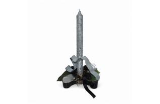 Silver candle in ceramic floral arrangement – decorative object