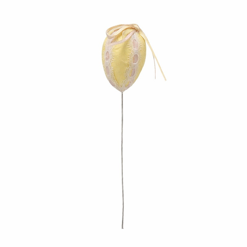 Geel paasei met strik op ijzerdraad 4 x 6 cm – sierlijk detail voor paasstuk en bloemdecoratie