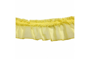 Yellow voile ruffle with matching gathered trim along the top and a neatly finished, flowing lower edge.