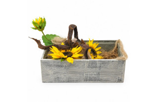 Yellow artificial sunflowers with a tall flower bud, curved brown branch, flax and jute in a wooden box