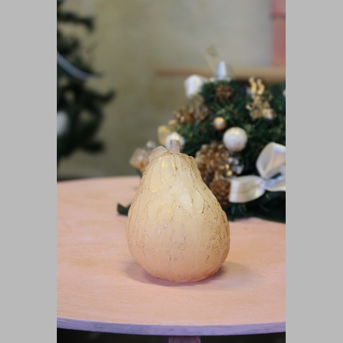 Candle in shape of pear color cream gold 9 cm