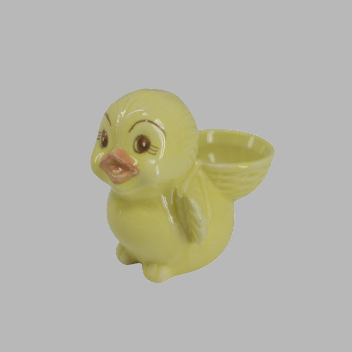 Easter chick with basket ceramic H 8 x 10 cm yellow