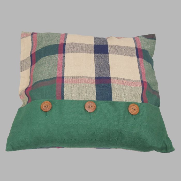 Decorative cushion cover block design with wooden buttons green